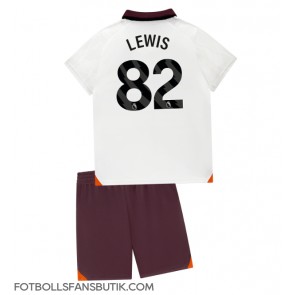 Manchester City Rico Lewis #82 Replika Bortatröja Barn 2023-24 Kortärmad (+ Korta byxor)